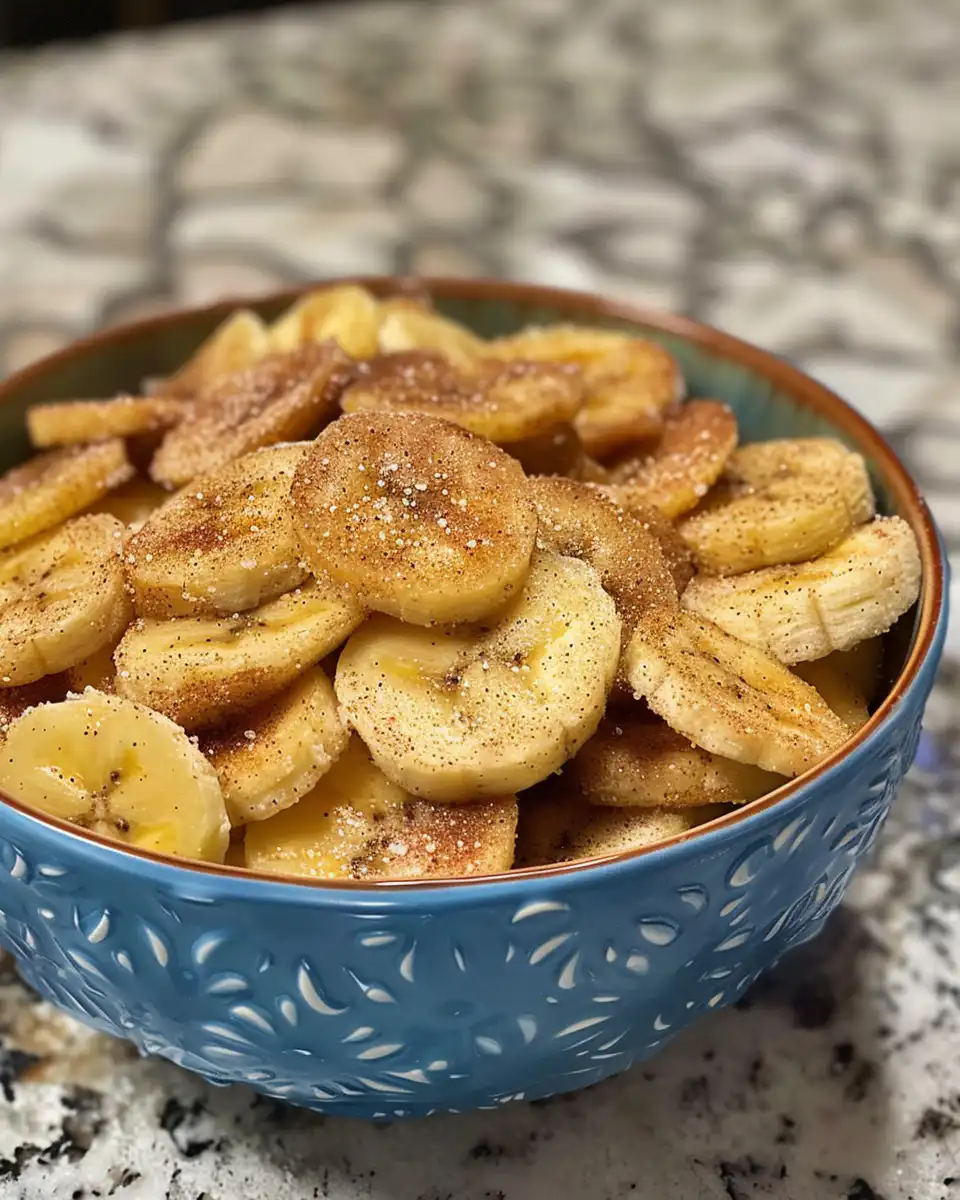 Ingredients for cinnamon sugar air fryer banana chips prepared in bowl