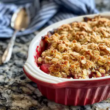 Rhubarb Crisp taken with iphone 15 pro max --iw 2 --ar 4:5 --v 6.0 --raw