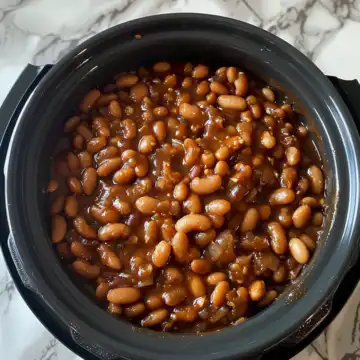Slow Cooker Boston Baked Beans taken with iphone 15 pro max --iw 2 --ar 4:5 --v 6.0 --raw