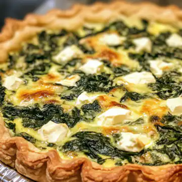 Spinach Quiche taken with iphone 15 pro max --iw 2 --ar 4:5 --v 6.1 --raw