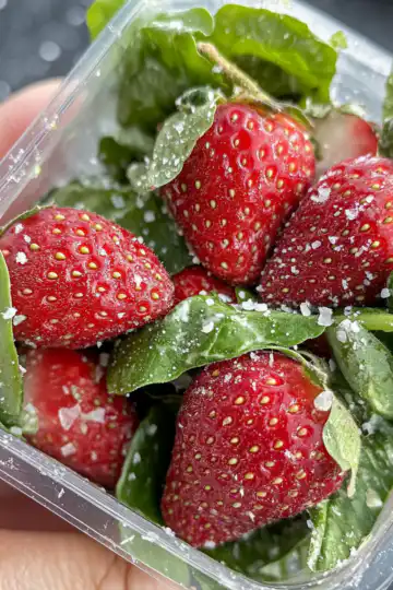 Spring Salad with Strawberries taken with iphone 15 pro max --iw 2 --ar 4:5 --v 6.1 --raw