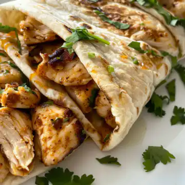 Sweet Chili Chicken Wraps taken with iphone 15 pro max --iw 2 --ar 4:5 --v 6.0 --raw