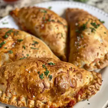 Air Fryer Calzones taken with iphone 15 pro max --iw 2 --ar 4:5 --v 6.0 --raw