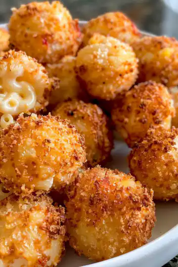 Air Fryer Fried Macaroni and Cheese Balls taken with iphone 15 pro max --iw 2 --ar 4:5 --v 6.0 --raw