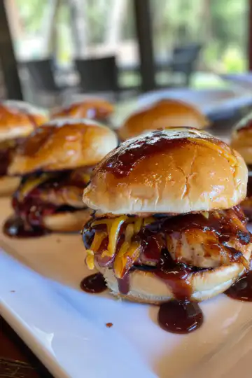 BBQ Chicken Sliders taken with iphone 15 pro max --iw 2 --ar 4:5 --v 6.0 --raw