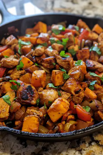 BBQ Chicken Sweet Potato Skillet taken with iphone 15 pro max --iw 2 --ar 4:5 --v 6.0 --raw