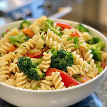 Broccoli Pasta Salad taken with iphone 15 pro max --iw 2 --ar 4:5 --v 6.0 --raw