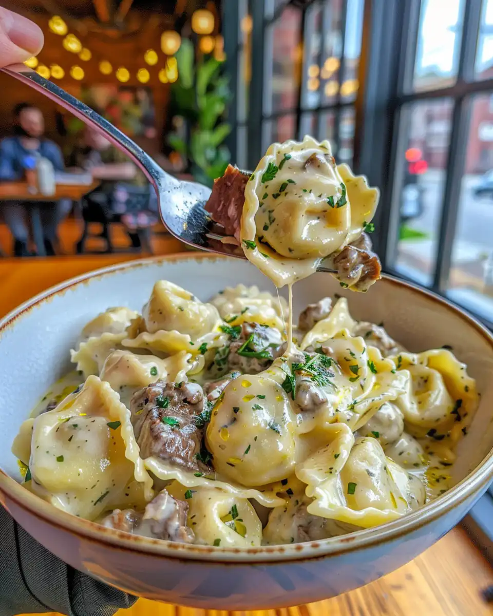 Ingredients including thinly shaved beef, provolone cheese, tortellini