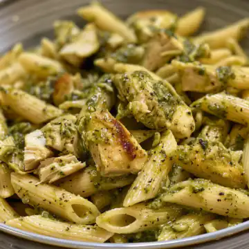 Chicken Pesto Pasta taken with iphone 15 pro max --iw 2 --ar 4:5 --v 6.0 --raw