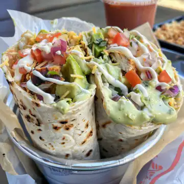 Chipotle Ranch Grilled Chicken Burrito taken with iphone 15 pro max --iw 2 --ar 4:5 --v 6.0 --raw