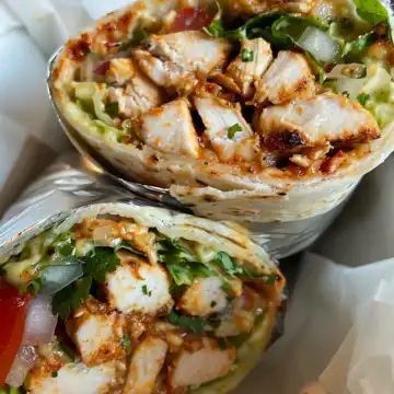 Chipotle Ranch Grilled Chicken Burrito taken with iphone 15 pro max --iw 2 --ar 4:5 --v 6.0 --raw