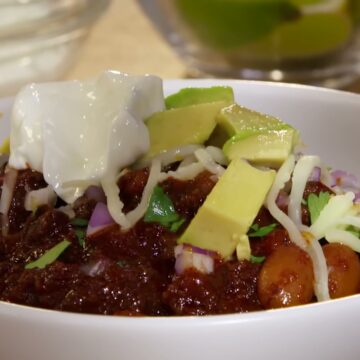 Side view of classic hearty beef chili ready to serve