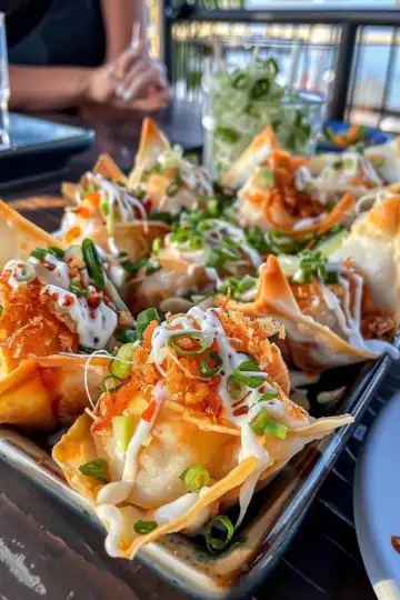 Crab Rangoon Bombs taken with iphone 15 pro max --iw 2 --ar 4:5 --v 6.0 --raw