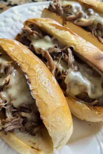 Crockpot French Dip Sandwiches taken with iphone 15 pro max --iw 2 --ar 4:5 --v 6.0 --raw