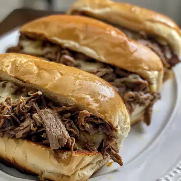 Crockpot French Dip Sandwiches taken with iphone 15 pro max --iw 2 --ar 4:5 --v 6.0 --raw