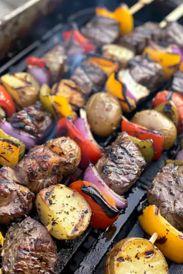 Grilled Steak and Potato Kabobs taken with iphone 15 pro max --iw 2 --ar 4:5 --v 6.0 --raw