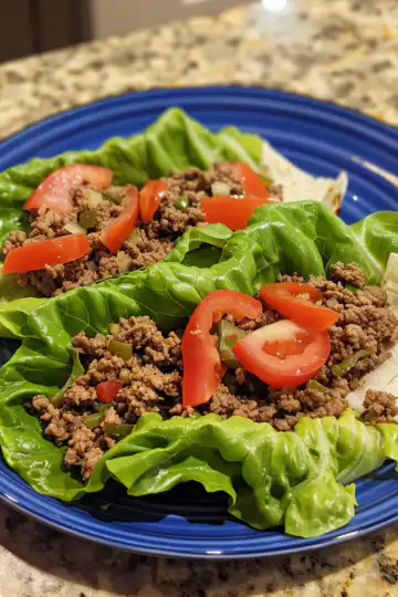 Ground Beef Lettuce Wraps taken with iphone 15 pro max --iw 2 --ar 4:5 --v 6.0 --raw
