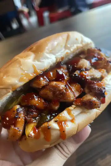 Korean BBQ Chicken Sandwich taken with iphone 15 pro max --iw 2 --ar 4:5 --v 6.0 --raw
