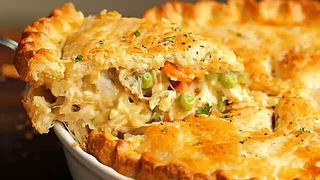 Close-up of old-fashioned chicken pot pie showing the texture and color detail