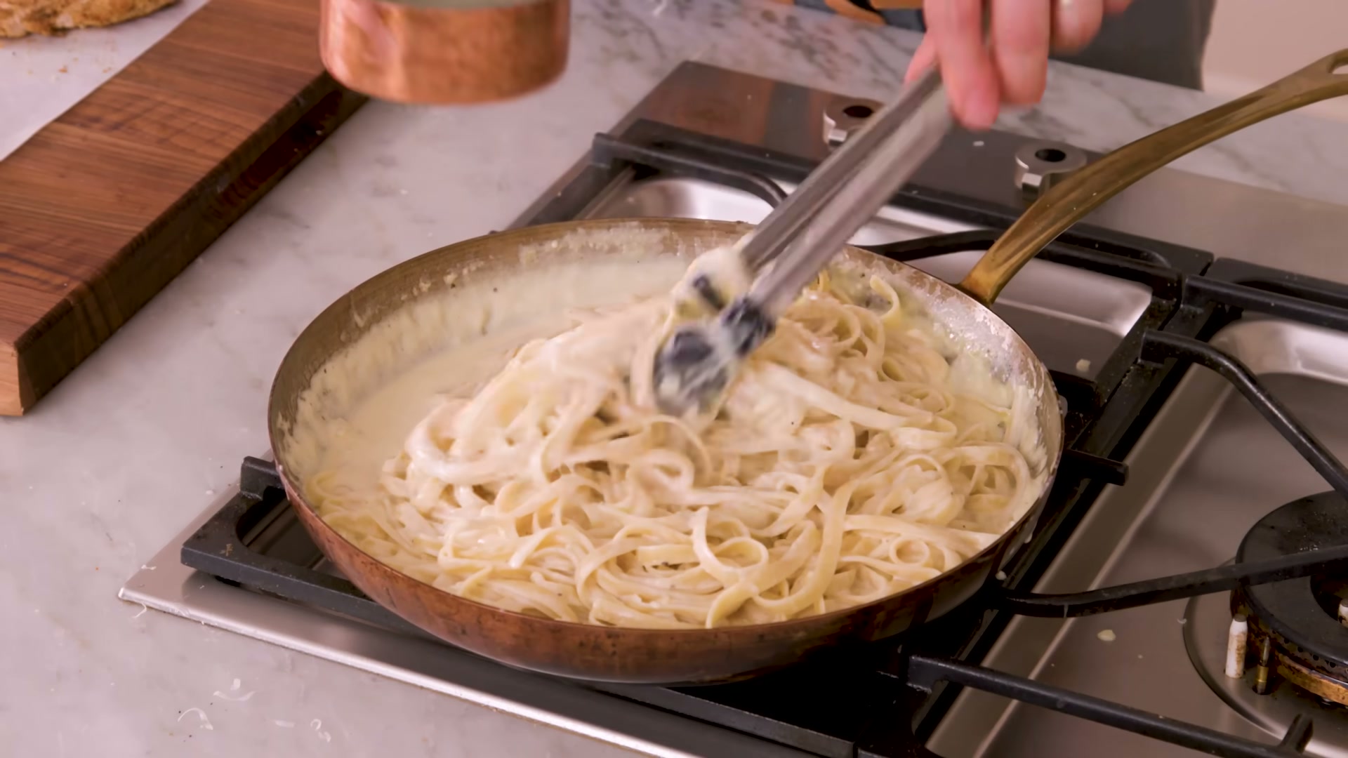 Close-up of one-pot chicken alfredo pasta showing the texture and color detail