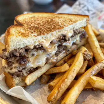 Patty Melt with Secret Sauce taken with iphone 15 pro max --iw 2 --ar 4:5 --v 6.0 --raw