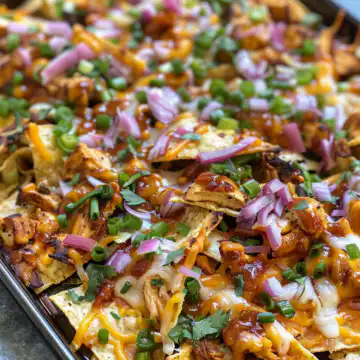 Sheet Pan BBQ Chicken Nachos taken with iphone 15 pro max --iw 2 --ar 4:5 --v 6.0 --raw