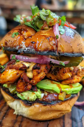 Spicy Chicken Avocado Brioche taken with iphone 15 pro max --iw 2 --ar 4:5 --v 6.0 --raw